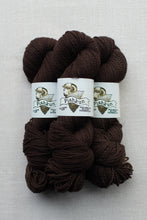 Load image into Gallery viewer, Three skeins of dark brown yarn with white paper labels reading 'Piskun' and 'Caramel', arranged on a light gray textured background.