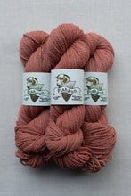 Load image into Gallery viewer, Three skeins of dusty rose pink yarn with white paper labels reading 'Pishkun' and 'Hand-dyed Organic Wool' stacked on a light gray textured background.