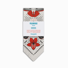 Load image into Gallery viewer, Polebridge bandana packaging with floral design on a white background