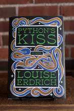 Load image into Gallery viewer, Book cover of 'Python's Kiss' by Louise Erdrich against a brick wall background