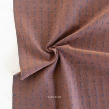 Load image into Gallery viewer, Brown fabric with subtle pattern on a plain background, featuring the brand 'Fableism'.