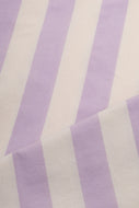 Close-up of fabric with purple and white vertical stripes