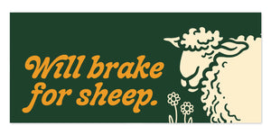 Sign with a sheep illustration and text 'Will brake for sheep' on a green background