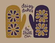 Load image into Gallery viewer, A graphic design featuring two oven mitts with floral cutout patterns, one in mustard gold and the other in dark purple, on a warm beige background with the text 'daisy dukes by Shelli Can'.
