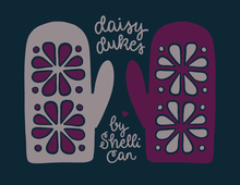 Load image into Gallery viewer, Two decorative oven mitts with floral cutout patterns on a dark teal background, with the text 'daisy dukes by Shelli Can' in white script.