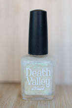 Load image into Gallery viewer, Nail polish bottle with &#39;Death Valley&#39; text on a wooden surface