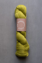 Load image into Gallery viewer, Yellow skein of yarn with a pink label on a gray background