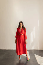 Load image into Gallery viewer, Woman wearing a red dress standing against a plain background