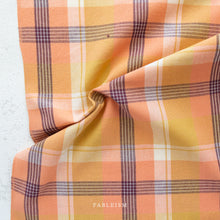 Load image into Gallery viewer, Plaid fabric with orange, yellow, and brown colors on a light gray background, featuring the brand 'Fableism'.