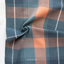 Load image into Gallery viewer, Plaid fabric with blue, brown, and orange colors on a white background, featuring the brand 'Fableism'.