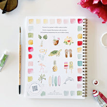 Load image into Gallery viewer, Art book titled &#39;Learn to Paint with Watercolor&#39; on a table with art supplies.