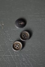 Load image into Gallery viewer, Three metal buttons on a textured gray surface