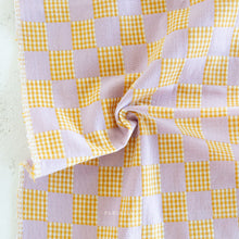 Load image into Gallery viewer, Yellow and white checkered fabric on a light background