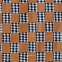 Load image into Gallery viewer, Checkered pattern with brown and black squares on a fabric background