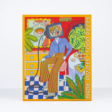 Load image into Gallery viewer, Colorful puzzle box with a person wearing a tiger head and various objects on a white background