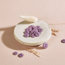 Load image into Gallery viewer, Purple buttons on a round ceramic dish with dried grasses on a beige background