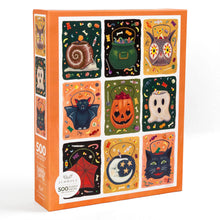Load image into Gallery viewer, Halloween-themed puzzle box with colorful illustrations on an orange background