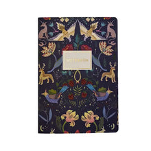 Load image into Gallery viewer, Notebook with a colorful unicorn and floral design on a dark background