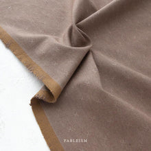 Load image into Gallery viewer, Brown fabric with a subtle pattern and brown border, featuring the brand 'Fableism'.