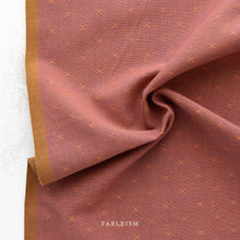 Load image into Gallery viewer, Brown fabric with subtle pattern and 'Fableism' branding on a white background