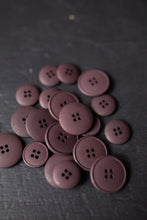 Load image into Gallery viewer, Collection of maroon buttons on a dark surface