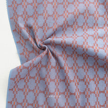 Load image into Gallery viewer, Close-up of patterned fabric with geometric design on a light background