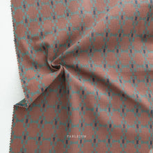 Load image into Gallery viewer, Fabric swatch with a checkered pattern in red and green on a white background, featuring the brand 'Fableism'.