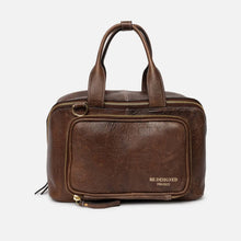 Load image into Gallery viewer, Brown leather bag with gold zipper on a white background