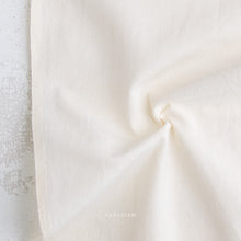 Load image into Gallery viewer, Close-up of textured white fabric with a brand name 'Galelism' in the corner.
