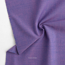 Load image into Gallery viewer, Close-up of purple fabric with 'Fableism' branding on a white background