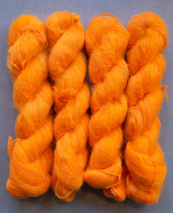orange fuzzy yarn hanks
